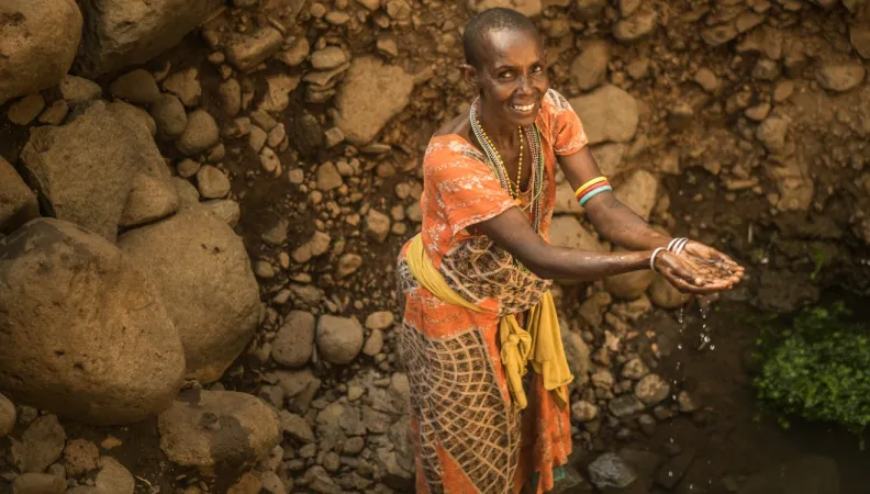 A samburu woman at Kenya well AFD Water